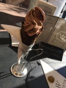 Chocolate soft ice cream w/ macaron at Hugo & Victor